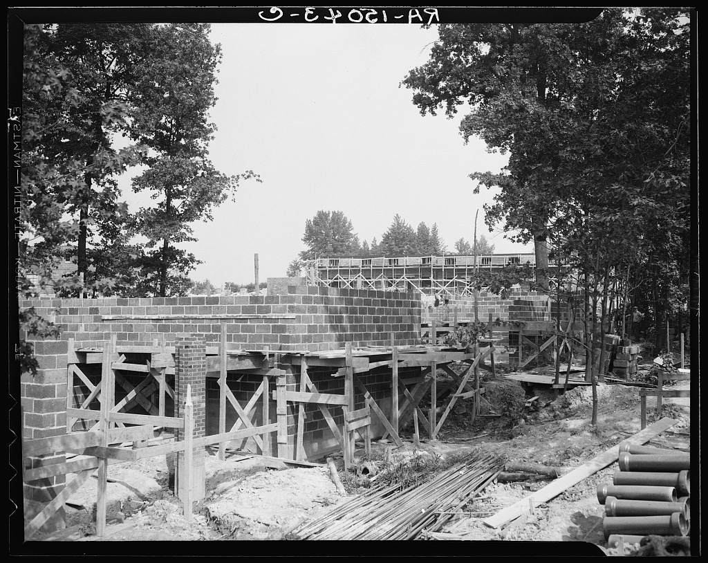 A house under construction in Greenbelt, Maryland, 1936. Library of Congress.